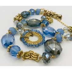 Stunning glass bead necklace, blue and grey with gold chain. 30" length Condition: Pre-Owned Like New Like new!  Thank you for visiting our shop! Blue Costume Jewelry Necklace With Chain, Elegant Blue Long Chain Necklace, Elegant Long Blue Chain Necklace, Elegant Blue Beaded Necklaces With Chain, Elegant Blue Beaded Necklace With Adjustable Chain, Blue Glass Beaded Chain Jewelry, Blue Glass Necklaces With Adjustable Chain, Blue Long Glass Necklace, Blue Beaded Long Necklace With Adjustable Chain