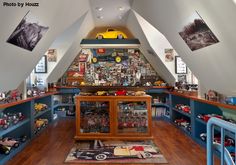 a room filled with lots of toy cars and shelves full of action figures on top of them