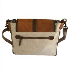 Descripción:
 Nuestro bolso de hombro es perfecto para el uso diario informal. Está diseñado para ser versátil y práctico, con bolsillos interiores funcionales que ofrecen un amplio espacio para mantenerse organizado y con estilo. El bolso está hecho de tiendas de campaña militares recicladas y cuero en tonos tostados y tiene un cierre de solapa.
 Características:




 Lona estampada y cuero genuino 




 Para llevar a cualquier parte






 Dramático y elegante



 Presupuesto:


 Tipo de bolso: bandolera

 Material del bolso: lona y cuero genuino

 Altura: 30,4 cm o 12"

 Ancho: 25 cm o 10"

 Profundidad: 8,8 cm o 3,5"

 Color: Bronceado, Beige

 Cantidad con precio: 1 bolsa Khaki Leather Shoulder Bag For On-the-go, Brown Coated Canvas Flap Shoulder Bag, Brown Flap Shoulder Bag In Coated Canvas, Beige Tote Shoulder Bag For Outdoor, Brown Leather Trim Shoulder Bag For On-the-go, Functional Brown Crossbody Shoulder Bag, Brown Flap Shoulder Bag For Everyday Use, Daily Use Coated Canvas Shoulder Bag With Flap, Brown Functional Shoulder Bag With Removable Pouch