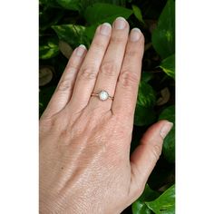 Classic and elegant, this vintage inspired pearl solitaire engagement ring exudes a timeless elegance with a simple band of gold set with a glowing pearl in a crown of hearts. Hand-wrought from recycled 14kt gold, a slim gold band holds a 6.5-7mm cultured creamy white freshwater pearl in a detailed 14kt gold filigree heart-crown setting. Pearl engagement rings are not only unique, but hold a special meaning as pearls symbolize wisdom, purity, harmony and loyalty. This ring would also make a love Elegant Yellow Gold Moonstone Ring With Bezel Setting, Solitaire Pearl Ring For Anniversary, Heirloom 14k Gold Pearl Ring With Rose Cut Diamonds, Anniversary Solitaire Pearl Ring With Round Cut, Classic 14k Gold Moonstone Ring Gift, Dainty Pearl Promise Ring With Round Cut, Timeless Pearl Ring With Prong Setting For Anniversary, Classic Pearl Promise Ring With Center Stone, Timeless White Pearl Ring In 14k Gold