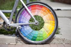 a bicycle with a rainbow wheel painted on it