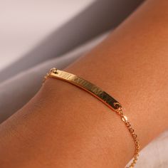 "This engraved bracelet features Roman numerals, adding a touch of personalization and elegance. Crafted with care, it's the perfect gift choice for her, reflecting both your thoughtfulness and the sentiment behind the date. Embrace the beauty of personalized jewelry and make her feel cherished with our Personalized Roman Numeral Bracelet, a meaningful and stylish accessory that she'll love to wear and treasure. #YOU MAY LIKE THIS silver bar cotton bracelet https://www.etsy.com/listing/149277659 Classic Personalized Charm Bracelet For Anniversary, Classic Name Bracelet As A Gift, Classic Name Bracelet For Mother's Day Gift, Elegant Personalized Charm Bracelet With Nameplate, Elegant Custom Name Charm Bracelet As Birthday Gift, Elegant Custom Name Charm Bracelet For Birthday, Elegant Nameplate Charm Bracelet For Gift, Elegant Custom Name Charm Bracelet For Birthday Gift, Elegant Nameplate Charm Bracelet Gift