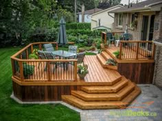 a wooden deck with steps leading up to it