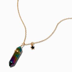 This gold-tone necklace gives off a colorful, ethereal vibe that you are sure to love. The necklace has a faux mystical gem pendant in a rainbow of beautiful jewel tones plus a small black star dangle for a celestial touch.Finish: Gold-toneLength: 16 + 3 in. extender / 40.64 + 7.62 cm. extenderClosure: Lobster claspMaterial: Plastic, Metal - Claire's Jewel Tone Mystical Gem Pendant Necklace Rainbow Metal Jewelry With Adjustable Chain, Iridescent Nickel-free Spiritual Necklaces, Rainbow Spiritual Pendant Jewelry, Magical Iridescent Pendant Necklaces, Iridescent Magical Pendant Necklace, Magical Iridescent Pendant Necklace, Mystical Iridescent Pendant Necklace, Fairycore Fashion, Gem Pendant