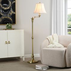 a living room scene with focus on the floor lamp