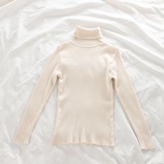 This is perfect for those who are looking for a clothing for a good price. It is fashionable, stylish, and it will look great on anyone who wears it. Do you wanahavit? Beige Ribbed High Neck Sweater, Beige Ribbed High-neck Sweater, Soft Knit Turtleneck For Spring, Chic Beige Ribbed Turtleneck, Chic Winter Sweater With Ribbed Collar, Beige Ribbed Turtleneck Sweater, Cream Fine Knit Top For Fall, Fine Knit Cream Top For Fall, Trendy Beige High Neck Turtleneck