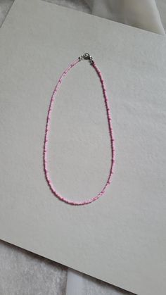 This handmade necklace is from out Minimalist collection - Blossom is one of many colour variations Minimalist Single Strand Beaded Necklace, Minimalist Beads For Jewelry Making, Handmade Pink Necklaces For Everyday Wear, Handmade Pink Necklace For Everyday, Handmade Pink Necklace For Everyday Wear, Minimalist Beaded Necklace For Gift, Handmade Pink Everyday Necklaces, Trendy Everyday Necklaces With Tiny Beads, Pink Single Strand Necklace For Beach