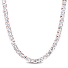 Feel like a princess in this classic Cubic Zirconia Tennis Necklace. Mounted in luminous rose plated sterling silver, it features 103 round-cut, sparkling cubic zirconia gemstones (4 x 4mm) embellished in a tennis motif for an elegant and bold look. Enhanced with a high polish finish, this CZ tennis necklace is 17-inches long and fastens with a pressure tongue clasp. This gorgeous gemstone tennis necklace is an ideal choice for today's contemporary woman. Classic Rose Gold Cubic Zirconia Diamond Necklace, Iced Out Rose Gold Necklace For Formal Occasions, Formal Rose Gold Diamond Tennis Necklace, Rose Gold Diamond Tennis Necklace For Formal Occasions, Rose Gold Diamond Iced Out Necklace, Iced Out Rose Gold Diamond Necklace, Rose Gold Diamond Tennis Necklace For Anniversary, Rose Gold Tennis Necklace With Diamond Accents, Rose Gold Diamond Tennis Necklace With Brilliant Cut