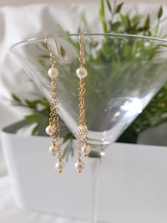 This earrings are made with natural freshwater pearls beads (5-6 mm), 14k gold filled chain and 14k gold filled earrings hoops.  The length of the earrings includes the hoop is approximately 6 cm. Please contact me in case you have any questions. Long Drop Pearl Chain Earrings 14k Gold Filled, Hypoallergenic 14k Gold-filled Dangle Pearl Earrings, Hypoallergenic 14k Gold Filled Dangle Pearl Earrings, Diy Pearl Earrings, Long Earrings Gold, Dangle Pearl Earrings, Formal Earrings, Graduation Jewelry, Long Gold Earrings