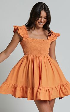 Get ready to turn heads in the Brynlee Mini Dress! This vibrant orange dress is perfect for any occasion, whether you're heading to brunch with friends or a casual day at the office. The elastic chest and flutter sleeve hem add a flirty touch, while the square neckline and fit & flare silhouette create a flattering shape. Made from comfortable cotton fabric, this dress will keep you cool and comfy all day long. Embrace your individuality and express yourself with this empowering mini dress that Cotton Dress Fabric, Winter Formal, Dress Cotton, Vibrant Orange, Orange Dress, Fabric Squares, Hem Dress, Fit Flare Dress, Square Neckline