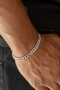 Shiny black cording knots around the ends of a silver beveled curb chain that is wrapped across the top of the wrist for a versatile look. Features an adjustable sliding knot closure. Adjustable Knot Bracelet, Adjustable Sliding Knot, Sliding Knot Closure, Mens Chain Bracelet, Mens Silver Jewelry, Mens Bracelet Silver, Mens Jewelry Necklace, Hand Bracelet, Mens Black Leather