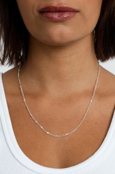 Life is too short to wear boring jewelry. With Harlow, you get the classic feel of a chain necklace, with a modern twist in design. Intricate detailing gives this piece a fresh, luxe feel for everything from cocktail parties to jeans and tees. Add your favorite charm to complete your look. Sterling silver 3mm chain width Available in 3 lengths Trendy Sterling Silver Snake Chain Necklace, Sterling Silver Necklace With Delicate Chain For Party, Chic Sterling Silver Chain Necklace, Classic Silver Chain Necklace For Everyday, Classic Everyday Silver Chain Necklace, Trendy Sterling Silver Chain Necklaces, Chic Sterling Silver Jewelry With Delicate Chain, Trendy Sterling Silver Chain Necklace For Party, Chic Figaro Chain Necklaces