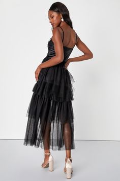 Bring a flirtatious flair to any event with the Lulus Sultry Sweetness Black Tiered Tulle Maxi Dress! Airy woven tulle shapes this breathtaking dress that has adjustable spaghetti straps and a darted bodice with a straight neckline and a banded satin waist. Skirt has tiers of lightweight tulle that falls to a sheer maxi hem. Hidden zipper/clasp at back. Fit: This garment fits true to size. Length: Ankle length. Size medium measures 45.50" from adjustable straps to hem. Bust: Great for any cup si Summer Party Corset Dress With Tulle Skirt, Sheer Spaghetti Strap Dress For Evening, Sheer Spaghetti Strap Evening Dress, Sheer Dress With Spaghetti Straps For Evening, Sheer Midi Dress With Fitted Bodice For Evening, Sheer Evening Dress With Spaghetti Straps, Elegant Sheer Mesh Dress With Spaghetti Straps, Evening Dress With Sheer Spaghetti Straps, Chic Tulle Corset Dress With Sweetheart Neckline