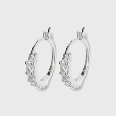 Bring sparkle and shine to your casual and dressed-up looks with these Women's Sterling Silver Cubic Zirconia Hoop Earring - Silver. Featuring the classic hoop design that hugs your earlobes perfectly, these silver-finished hoop earrings are designed with studded zirconia crystal accents that add the perfect touch of shine to your looks. Elegant and timeless, these earrings can be worn on their own for a sparkly flair or stacked with other stone-studded huggies for a more balanced ensemble. Gend Turkey Shopping, Cubic Zirconia Hoop Earrings, Candle Pedestal, Amazon Jewelry, Earring Silver, Nickel Free Earrings, Hoop Design, Tassel Drop Earrings, Hoop Earring Sets