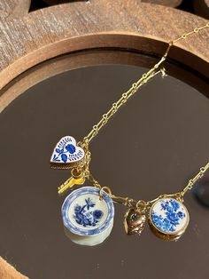 Gold plated stainless steel 16in chain. One glass charm in the middle with metal charms on both sides. Blue Charm, Metal Charms, Dry Clay, Metal Charm, Air Dry Clay, Versailles, Jewelry Ideas, In The Middle, Air Dry