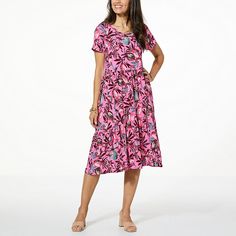 Comfort Code Printed Jersey Knit Tiered-Hem T-Shirt Dress  Feminine and flirty minus the fuss. This simple yet stunning maxi dress has versatility, style, and most of all … comfort. It’s easy to wear and easy to pair with any shoe, jacket, or cardigan. However, the relaxed flowy style and tightly knit jersey fabric make it just perfect all on its own. Asymmetric tiers with shirring make this closet staple easy to dress up or down from running errands to being out on the town. Casual Pink A-line Maxi Dress, Pink A-line Casual Maxi Dress, Casual A-line Maxi Dress With Relaxed Fit, Pink Relaxed Fit Midi Dress With Short Sleeves, Dress Feminine, Flowy Style, Pink Pineapple, Printed Jersey, Closet Staples