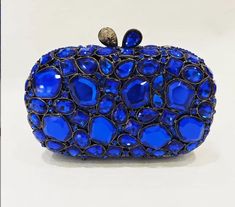 Big Stones Evening Purse Bags Rhinestone Wedding Gems Clutch Bag Bridal Clutches Women Diamonds Party Purses Bag The images shown are not the actual item and are for your reference only. BAG SIZE AS FOLLOW: length:18cm width:6cm high:12cm Blue Glamorous Bags For Gifts, Glamorous Blue Bags For Gifts, Blue Rhinestone Evening Bag For Weddings, Blue Evening Bag With Rhinestones, Glamorous Blue Bags With Rhinestones, Glamorous Blue Formal Bag, Blue Rhinestone Evening Bag For Party, Blue Embellished Evening Bag For Formal Occasions, Formal Blue Embellished Evening Bag