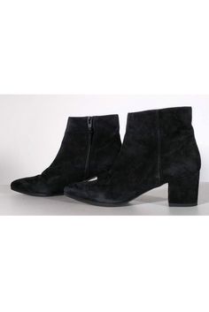 Stylish ankle booties made in luxe suede. They feature a chic pointed toe and classic blocked heel. Perfect to wear with a sweater dress and tights. Size 6.5 M Suede upper Leather lining Manmade sole Made in Spain Stacked heel Side zippers Light wear on soles Some wear/marks on suede Heel height 2.25" Winter Workwear Boots With Block Heel, Pointed Toe Booties With Reinforced Heel For Winter, Winter Pointed Toe Booties With Reinforced Heel, Suede Boots For Workwear In Winter, Winter Booties With Reinforced Heel And Pointed Toe, Chic Fitted Low Heel Booties, Winter Suede Boots For Workwear, Winter Workwear Heeled Boots With Pointed Toe, Winter Workwear Suede Boots