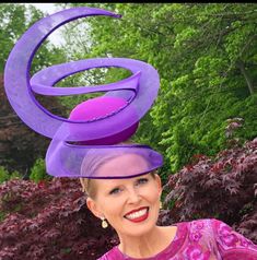 Hat Title : The Twist (in Violet)  *Can also be made in other colours. Enquire if you'd want a colour different than the photos.                           This hat was especially made for the Royal Ascot Pop Up Shop in Kensington London  The Twist is an elegant headwear sculpture featuring a front facing round button base and a structured veil that start from the side of the face, over the face, and spirals upwards creating a perception of height and drama.  This haute couture headpiece is perfe Crazy Kentucky Derby Hats, Crinoline Fascinator, Purple Fascinator, British Hats, Kentucky Derby Fascinator, Royal Ascot Hats, Occasion Hats, Couture Hats, Derby Fascinator