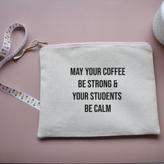 a white bag with the words may your coffee be strong and your students be calm