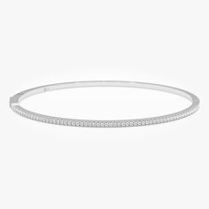 ✥ Celebrate a special birthday with our Round Cut Diamond Bracelet Bangle. This elegant piece features dazzling round cut diamonds set in a timeless bangle design, perfect for adding a touch of sophistication to any outfit. Crafted with care from high-quality materials, it ensures lasting beauty and durability. Ideal as a birthday gift, this bracelet symbolizes love and appreciation, making it a memorable and cherished present for someone special. Center Stone Details:Stone Type: MoissaniteStone Cut: Round Cut Stone Total Weight: 1.0ctColor: DEFClarity: VVSMake: Hight Quality Craftmanship Metal Details:Metal Type: Solid GoldMetal Purity: 10K | 14K | 18KMetal Tone: Yellow | Rose | White Bracelet Details:Bracelet Length: 5 Inches | 5.5 Inches | 6 Inches | 6.5 Inches | 7 Inches | 7.5 Inches | Classic Diamond Cuff Bracelet With Hand Set Details, Classic Diamond Cuff Bracelet With Hand-set Details, Timeless Bangle With Pave Setting, Dazzling Diamond Bangle Bracelet With Pave Setting, Classic Pave Setting Bangle For Formal Events, Classic Pave Setting Bangle For Formal Occasions, Classic Bangle With Pave Setting For Formal Occasions, Diamond Cuff Bracelet With Pave Setting For Anniversary, Classic Formal Bangle With Pave Setting