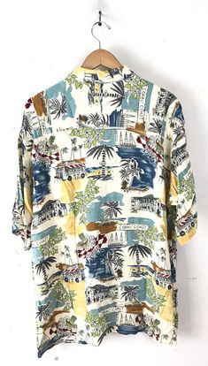 "-Description- >colorful island resort print men's hawaiian shirt >button front >collared >button close pocket on the front >mens XL >awesome print! >condition: great >color(s): multi >fabric(s): 100 rayon >brand: preswick & moore >care: machine wash -Measurements- >size: XL ✩ all measurements are taken with the item laying flat & some sizes are estimates so please check measurements ✩ chest: 50\" / 127cm length: 31\" / 78cm shoulder to sleeve end: 11\ Multicolor Hawaiian Camp Shirt For Beach, Hawaiian Multicolor Camp Shirt For Beach, Multicolor Hawaiian Shirt With Palm Tree Print, Multicolor Hawaiian Shirt For Beach, Hawaiian Printed Camp Shirt For Beach Season, Multicolor Palm Tree Print Camp Shirt For Beach Season, Multicolor Palm Tree Print Camp Shirt For Beach, Patterned Camp Collar Beach Shirt, Patterned Camp Shirt With Camp Collar For Beach