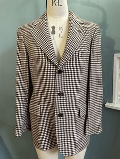 Beautiful Wool Jacket from AQUASCUTUM in a classic dogtooth checked wool in Dark Brown and white Horn buttons  Fully lined Great Condition Size 14 Classic Plaid Sport Coat, Classic Plaid Sport Coat With Lapel Collar, Elegant Plaid Outerwear With Single Button, Tailored Houndstooth Outerwear For Business, Tailored Houndstooth Business Outerwear, Classic Tailored Houndstooth Blazer, Classic Plaid Sport Coat For Work, Business Tweed Jacket With Houndstooth Pattern And Suit Collar, Formal Houndstooth Pattern Outerwear With Suit Collar