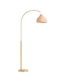 a gold floor lamp with a white shade on the top and an oval light fixture