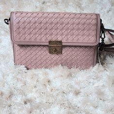 Brand New 100% Authentic Bottega Veneta Intrecciato Women's Bag In Dusty Rose Color. Features Three Separate Compartments, 1 Small Slip Pocket, Mirror Accessory, Adjustable/Removable Leather Strap. Dimensions: H: 7", W: 10", D:4.5 ", Strap Drop 20" Made In Italy. Comes With Care Cards And Dust Bag. Tag Price $2550 *All Bags Are Brand New. Bags May Have Creases, Indentations, And Marks From Being Stored. New Bags, Dusty Rose Color, Bottega Veneta Intrecciato, Bag Tag, Pocket Mirror, Rose Color, Dusty Rose, Bottega Veneta, Women's Bag