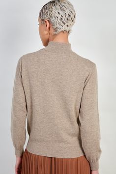 - Fit: True to size- Materials: 60% wool, 20% alpaca, 20% nylon- Thickness: Moderate- Sheerness: None- Stretch: None- Lining: None- Care: Dry clean or hand wash cold and dry in shade London Free, Buy Now Pay Later, Alpaca, Mock Neck, Light Brown, Knit Top, Buy Now, Dry Clean, Hand Wash