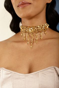 A Unique Vintage Filigree Choker perfectly suited for special occasions and someone that loves statement jewelry. The antique gold finish makes it a bold yet elegant necklace option. It's easy to style with traditional Indian or Pakistani suits, fusion outfits or even with a black dress. The choker necklace is versatile and easy to style. Wear it solo or pair it with matching lotus studs as a set. To complete the look and make it a set by adding a matching earrings, handpiece and bracelet from t Luxury Ornate Jewelry For Diwali, Luxury Bollywood Style Necklaces As Gift, Luxury Yellow Gold Choker For Formal Occasions, Luxury Elegant Necklaces For Diwali, Brass Jewelry With Intricate Design For Parties, Party Jewelry With Intricate Brass Design, Gold Necklaces For Party Festivals, Elegant Gold Choker For Festive Occasion, Elegant Metal Temple Necklace For Festivals