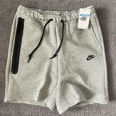 Brand New With Tags, Grey Gray, M Medium Gray Sportswear Shorts For Jogging, Nike Sporty Activewear With Side Pockets, Nike Fleece Sports Bottoms, Nike Fleece Bottoms For Sports, Sportswear Athletic Shorts With Pockets For Jogging, Sporty Gray Fleece Activewear, Gray Fleece Sporty Activewear, Nike Activewear With Pockets For Sports, Nike Activewear For Jogging With Side Pockets