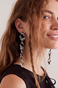 Take your jewelry game up a notch with these so cool earrings featured in a dangly design with uniquely-shaped rings for a super dimensional look. * Longline design * Post-back closure * Metal fabrication | Falling Stars Metal Dangle Earrings by Free People in Silver Cool Earrings, Falling Stars, Metal Fabrication, Accessories Jewelry Earrings, So Cool, Boho Clothing, Boho Outfits, Jewelry Earrings Dangle, Jewelry Accessories