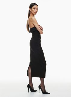 This is a lined strapless dress designed for a slim fit. It's cut from structured, subtly textured crepe that has a touch of stretch for shape retention and hold. Invisible back zip Back vent for ease of movement Stretch Lined Midi Dress For Date Night, Lined Stretch Midi Dress For Date Night, Fitted Strapless Midi Dress For Cocktail, Fitted Strapless Midi Dress For Cocktail Occasions, Strapless Stretch Bandage Dress For Evening, Stretch Strapless Bandage Dress For Evening, Fitted Bandage Dress With Straight Neckline For Evening, Elegant Stretch Strapless Dress For Gala, Fitted Strapless Bandage Dress For Formal Occasions