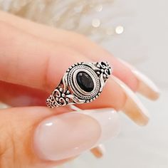 Oval Cut Black Onyx Ring Description: Sizes 4 - 12 Ring Height: 11mm Band Width: 3.4mm Stone Material: Black Onyx Stone Size: 7mm X 5mm Stone Shape: Oval Cut Stone Setting: Inlay Setting Metal: 925 Sterling Silver Plating: Rhodium Plated Thank You For Visiting My Shop Vintage Onyx Ring, Black Onyx Stone, Stone Material, Black Onyx Ring, Stone Setting, Ring Oval, Onyx Ring, Onyx Stone, Promise Ring