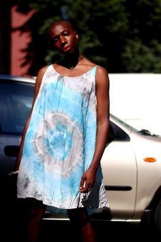 Synonymous with alternative cultures and  the bohemian and hippy lifestyle,  tie dye is a great print for summer adventures. This vintage dress, thanks to its on-trend silhouette and seductive details makes that perennial summer print a fashionable must-have.  Fabric: 100% rayon size: small to small. Please note that the straps are not adjustable Blue Boho Dress For Beach Cover-up In Summer, Blue Boho Sundress For Summer, Hippie Batik Print Dresses For Festival, Bohemian Batik Print Dress For Spring, Bohemian Tie Dye Sleeveless Sundress, Sleeveless Tie Dye Bohemian Dress, Hippie Hand Dyed Dresses For Spring, Bohemian Sleeveless Tie Dye Dress, Hand Dyed Flowy Summer Dresses