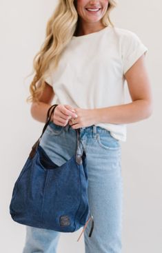 Our Anniston hobo bag is as cute as it is functional. It comes with two magnetic-snap compartments on top of each side of the main zipper-enclosed compartment. This makes it a breeze to throw in your phone or keys that you might need quick and easy access to, while still being able to zip up your wallet or cash in a more concealed and safe compartment. You're going to love the size of this bag too. it's big enough to store your necessities, but you'll never feel like you're carrying around a bul Versatile Canvas Crossbody Hobo Bag, Functional Crossbody Hobo Bag For Everyday, Versatile Everyday Hobo Bag With Zipper Pocket, Everyday Tote Shoulder Bag With Cell Phone Pocket, Casual Hobo Bag With Double Handle For On-the-go, Versatile Satchel Canvas Bag For Everyday Use, Canvas Crossbody Hobo Bag, Versatile Bags With Cell Phone Pocket For Everyday Use, Versatile Canvas Hobo Bag With Double Handle