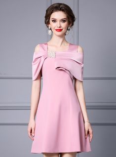 Elevate your style with this stunning pink dress, perfect for making a grand entrance at any event. The off-shoulder design is highlighted by a beautifully draped bow, adding an element of sophistication and elegance. The A-line silhouette is designed to flatter your figure, providing a sleek and graceful look. The soft pink color exudes femininity and charm, making you the center of attention. Crafted from premium fabric, this dress ensures comfort and ease of movement, allowing you to enjoy th Elegant Cold Shoulder Mini Dress For Formal Occasions, Elegant Cold-shoulder Mini Dress For Formal Occasions, Elegant Off Shoulder Dress With Straight Neckline For Banquet, Chic A-line Off Shoulder Wedding Dress, Elegant Cold Shoulder Cocktail Mini Dress, Elegant One-shoulder Mini Dress For Banquets, Elegant One-shoulder Mini Dress For Banquet, Pink Evening Dress With Straight Neckline, Elegant One-shoulder Mini Dress With Bow