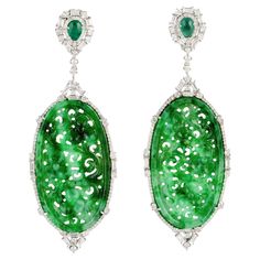 18kt:11.718g,D:2.807ct, ,Emerald:0.945ct,Jade:37.758ct,, Head Jewelry, Diamond Dangle Earrings, Jade Carving, Jade Jewelry, Oval Diamond, Fine Jewellery Earrings, Diamond Gemstone, Silver Color, Jade