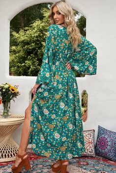 Green Boho Floral Bell Sleeve Top and Maxi Skirt Set Fitted Green Spring Kimono, Green Bohemian Wrap Maxi Dress, Green Long Sleeve Maxi Dress For Beach Season, Spring Bohemian Dress With Split, Bohemian Spring Dress With Split, Spring Bohemian Split Dress, Long Sleeve Green Maxi Dress For Beach Season, Fitted Green Kimono For Summer, Green Split Maxi Dress For Vacation