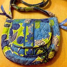 Perfection Vera Bradley Like New Purse With Terrific Shoulder Strap And Pockets Galore!! Will Bring A Smile To Your Face! Measurements: 9 Inches By 7 Inches Make This Lite Yet Highly Functional Organizer Bag Ideal! Blue Fabric Bag For Spring, Blue Fabric Bags For Spring, Spring Blue Fabric Bag, Blue Bohemian Bag With Pockets, Blue Bohemian Bags With Pockets, Face Measurements, Vera Bradley Purses, Organizer Bag, Lots Of Pockets