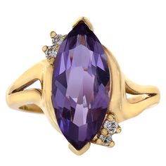 Amethyst Is A Meditative And Calming Stone Which Works In The Emotional And Physical Planes To Promote Calm And Peace. Simply Stunning, This Gemstone Ring Showcases An Elegant Marquise Cut 3.00 Carat Total Carat Weight (Size Of A Gemstone 14x7mm) Amethyst Gemstone And Diamond Accent 0.08 Carat Total Weight In A Prong Setting, Color/Clarity I,J-Si2. Set In 14k Yellow Gold, Ring Weighs 4.4 Grams, Width 16.3 Mm And Is Size 5.75. Free Re Sizing. Wcr3716 Vvs Clarity Amethyst Ring, Formal Purple Diamond Ring With Gemstone Accents, Formal Purple Birthstone Ring With Prong Setting, Purple Amethyst Gemstones With Diamond Accents, Formal Purple Amethyst Ring With Vvs Clarity, Fine Jewelry Marquise Purple Amethyst Ring, Fine Jewelry Purple Marquise Amethyst Ring, Marquise Amethyst Ring In Purple, Amethyst Diamond Ring With Accent Stones