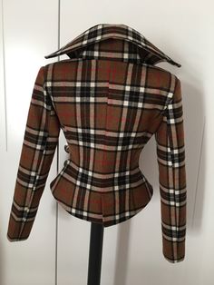 "This is a very stylish and elegant wool plaid jacket . Leght 58 cm - at back. made of very soft and high quality woolen fabric. The jacket is fully lined. SIZE CHART SIZE S - US 6, UK 8, EU 36 bust: bust around 34.5\"/90cm Waist: waist around 27.5\"/70cm Hips: hips around 34.5\"/90cm SIZE M - US 8, UK 10, EU 38 bust: bust around 37.5\"/95cm Waist: waist around 29.5\"/75cm Hips: hips around 37.5\"/95cm SIZE L - US 10, UK 12, EU 40 bust: bust around 39.5\"/100cm Waist: waist around 31.5\"/80cm Hi Plaid Wool Tweed Jacket With Notch Lapel, Plaid Wool Tweed Jacket For Business, Business Plaid Wool Tweed Jacket, Tailored Plaid Tweed Jacket With Lapel Collar, Plaid Wool Tweed Jacket For Tailoring, Fitted Double-breasted Houndstooth Outerwear, Fitted Double-breasted Houndstooth Blazer, Tailored Plaid Outerwear With Lapel Collar, Elegant Plaid Wool Coat For Work