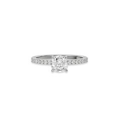 This ring is made with a cushion solitaire diamond set in four-prong setting, and is complemented by a round pave diamonds band.Details: - Made to Order- Diamond Weight: 1.00 CT, 1.25 CT, 1.50 CT, 1.75 CT, 2.00 CT, 2.25 CT, 2.50 CT, 2.75 CT, 3.00 CT- Accent Diamond Weight: 0.22 CT - No Of Diamonds: 19- Diamond Type: Lab Grown Diamond (CVD, HPHT)- Focal Diamond Cut: Cushion- Accent Diamond Cut: Round- Diamond Clarity: VS - Diamond Color: Colorless (DEF)- Setting Type: Prong and Pave- Band Thickness: 1.20 MM- Band Width: 1.75 MM- Metal Type: 14K Solid Gold,18K Solid Gold- Choice of Gold Color: Yellow Gold, White Gold, Rose Gold- Jewelry Certificate: All our jewelry comes with a 3rd Party Lab Certificate, verifying the authenticity of diamond and gold. Cushion Cut Lab Grown Diamond In White Gold, Classic Cushion Cut Ring With Pave Setting, Timeless Platinum Cushion Cut Diamond Ring, Modern Cushion Cut White Gold Jewelry, Silver Cushion Cut Lab Grown Diamond Wedding Rings, Dazzling Cushion Cut Promise Ring, 14k White Gold Cushion Cut Ring With Prong Setting, Cushion Cut Diamond Wedding Ring In White Gold, Cushion Cut Lab Grown Diamond Ring With Prong Setting