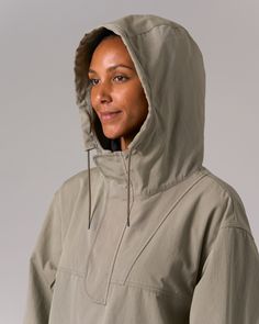 The Takibi Ripstop Anorak is a durable, fire-resistant hooded jacket. The anorak features two large flap pockets on the front, drawcords at the hood and hem, a covered half zipper on the front, and a zipper on the left side for easy on and off. Additional features include hand warmer pockets, an accessory loop on the right breast, ventilated panels on the back, and elastic cuffs. The material is an aramid-cotton blend with ripstop stitching throughout for fire resistance and durability. Hooded Raincoat With Drawstring For Hiking, Hooded Raincoat With Drawstring Hood For Outdoor Activities, Hooded Utility Jacket For Hiking, Hooded Raincoat With Adjustable Hood For Hiking, Utility Style Parka With Drawstring Hood For Streetwear, Hooded Hiking Raincoat With Double-lined Hood, Utility Parka With Pockets For Hiking, Outdoor Track Jacket With Drawstring Hood, Half-zip Hooded Jacket With Adjustable Hood For Fall