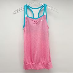 * Nwt Nike Girls Pink Tank Size Large *Features A Loose Fitting Pink Tank With Built In Blue Bra *5c82620eswtrmn Nike Stock, Baseball Tank Top, Baseball Tanks, Girls Sportswear, Kids Sportswear, Nike Neon, Blue Bra, Nike Tank, Nike Tank Tops