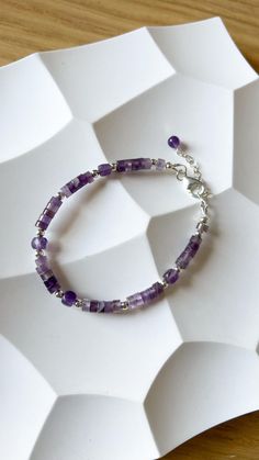 Shiny violet amethyst bracelet. It's original jewelry, beaded by hand, using only natural stone beads. Check my shop to see more matching bracelets:  https://www.etsy.com/shop/JewelsByMuzA?ref=shop-header-name&listing_id=1664043490&from_page=listing§ion_id=47678614 LENGTH: 15 cm + 3 cm chain. CLOSURE: lobster claw. MATERIALS: 4mm faceted amethyst square beads, furniture can be: stainless steel, goldened stainless steel or 925 silver. PLEASE NOTE, COLORS might be different because of the nature o Handmade Sterling Silver Crystal Bracelet For Healing, Sterling Silver Bracelets With Natural Stone Round Beads, Sterling Silver Bracelets With Round Natural Stone Beads, Sterling Silver Crystal Bracelet For Jewelry Making, Sterling Silver Gemstone Beads Bracelet For Jewelry Making, Silver Beaded Bracelets With Natural Stones For Healing, Healing Sterling Silver Beaded Bracelets With Gemstones, Sterling Silver Gemstone Beads Crystal Bracelet Gift, Sterling Silver Gemstone Beaded Bracelets For Jewelry Making