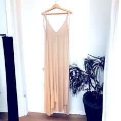 Nytt Dress With Plunge Neck, Cami Straps, Understated Cool, Relaxed Fit, Loose But Not Oversized In Size Medium. Runs Long But Can Be Tied Up! Color Is Cream/Beige/Pink Picture In Black Is From Asos Never Been Worn! Nwt Lightweight Linen-Mix Fabric Keeps You Cool Without Having To Whack Up The Ac Body: 82% Rayon, 12% Linen, 6% Spandex. Beige V-neck Slip Dress For Summer, Chic Beige Maxi Dress For Loungewear, Summer Backless Loungewear Dress, Fitted Beige Slip Dress For Beach, Beige Stretch V-neck Maxi Dress, Beige Stretch Maxi Dress With V-neck, Beige Summer Dress For Loungewear, Beige Maxi Slip Dress For Summer, Beige Midi Dress For Summer Loungewear