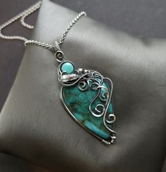 "Handmade wire wrap necklace chrysocolla gemstone, smooth, teardrop  genuine turquoise, round, smooth  herkimer diamond raw point crystal accent  sterling silver wire wrap, oxidized for an antiqued finish, tumbled and hand polished  2 3/4\" pendant length  24\" antiqued silver rolo chain, message me if a different size is needed  comes nicely packaged with a business card, jewelry care instructions and a polishing cloth" Elegant Turquoise Chrysocolla Necklace, Elegant Hand Wrapped Pendant Jewelry, Wire Wrapped Pendant Jewelry For Gifts, Wire Wrapped Pendant Jewelry Gift, Unique Wire Wrapped Dangle Jewelry, Unique Wire Wrapped Teardrop Pendant Jewelry, Unique Adjustable Teardrop Pendant Jewelry, Bohemian Wire Wrapped Teardrop Jewelry, Bohemian Teardrop Wire Wrapped Jewelry