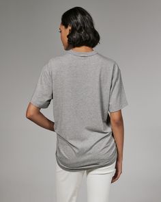 An oversized 4-way stretch cotton tee made intentionally boxy, with the perfect amount of slouch. Wear it with shorts or your favorite pair of jeans. Details Model is 5'9" and wears a size small. Care: Turn inside out. Machine wash cold on delicate cycle with similar colors. Tumble dry on low. Iron on low if needed. Composition: 57% Cotton | 38% Modal | 5% Spandex Casual Heather Grey T-shirt For Loungewear, Gray Athleisure T-shirt For Summer, Gray Boxy Fit Cotton T-shirt, Gray Boxy Cotton T-shirt, Oversized Heather Grey Sporty Top, Basic Oversized Gray T-shirt, Oversized Gray Basic T-shirt, Oversized Soft-washed Gray Tops, Gray Boxy Fit Short Sleeve T-shirt